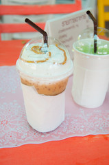 cup of ice coffee on the cafe table