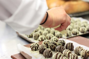 chef making chocolate truffles