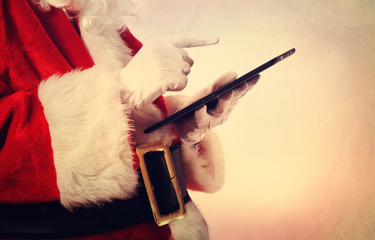 Santa Claus with tablet