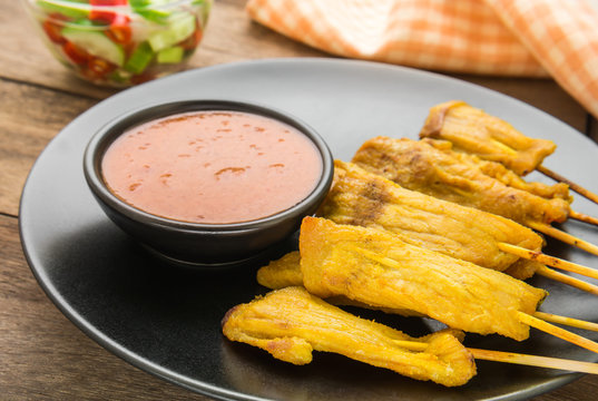 Grilled Pork Satay With Peanut Sauce On Plate