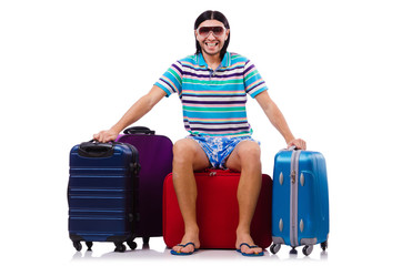 Man travelling with suitcases isolated on white