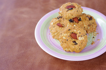 Cookies on leather backkground