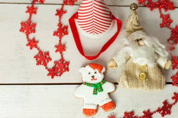 Fototapeta na wymiar Christmas gingerbread painted icing and vintage handmade toys