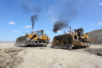 two bulldozers