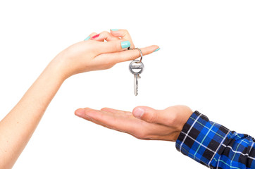 closeup hands handing over key concept of buying deal sale