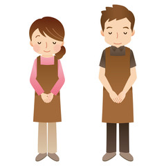 エプロンをつけたスタッフ