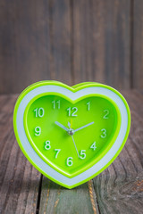 Clock on wood background