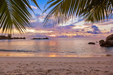 Seychelles tropical beach at sunset