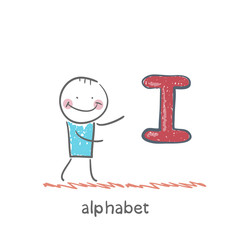 man standing with a letter of the alphabet