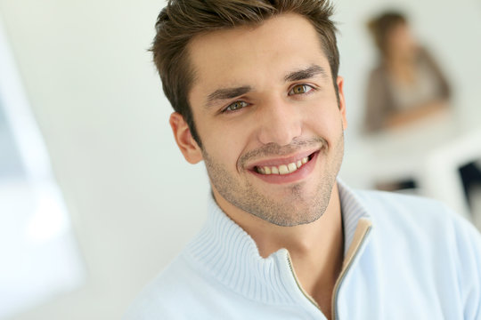 Portrait of young smiling man