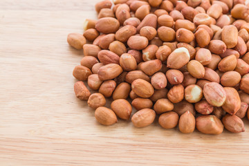 peanuts on wood background