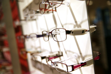Eyeglasses set on a display unit in shop