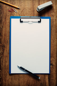 Blank white paper on a clipboard