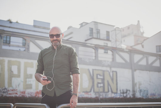 Handsome Middle Aged Man Listening To Music