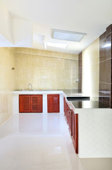 empty concrete counter kitchen with beige wall tile