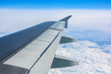 Fototapeta na wymiar Airliner above the clouds