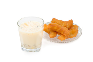 Soybean milk with fried bread stick isolated