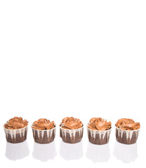 Moist chocolate cupcake over white background