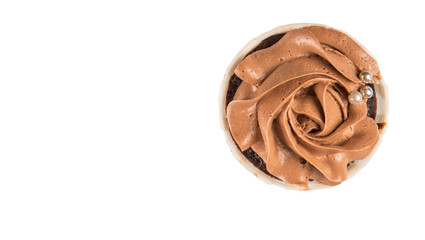 Moist chocolate cupcake over white background