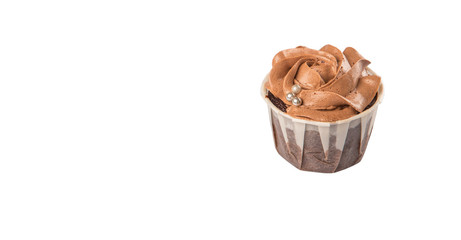 Moist chocolate cupcake over white background