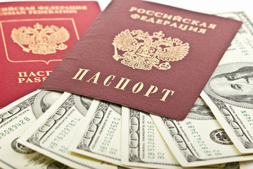 Russian passport with American dollars