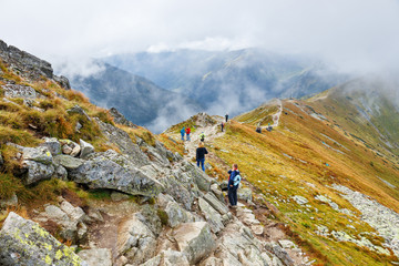 Group of tourists walking in the Tatra Mountains