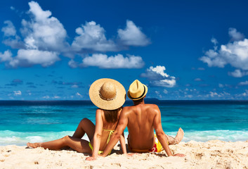 Couple on a beach at Seychelles - 73358218
