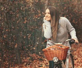 Beautiful woman enjoying nature driving bicycle