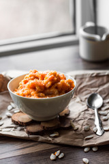 pumpkin porridge with milk in white piala breakfast