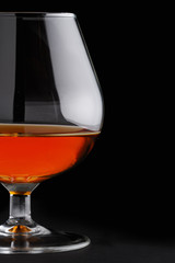 Close-up of cognac on black background