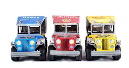 three colored small offroad cars