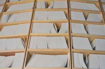 Coloured file folders in office cabinet