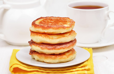 Curd pancakes stack and tea