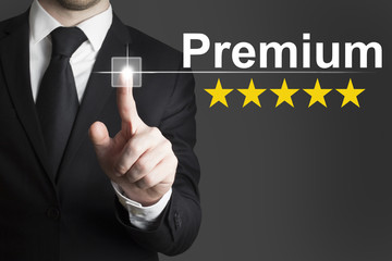 businessman pushing flat button premium golden rating stars