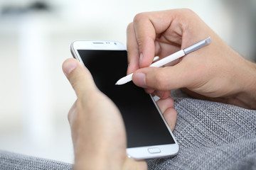 Closeup of digital pen on smartphone screen