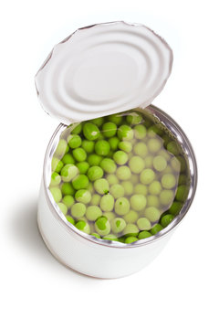 Green peas in the can isolated on white background