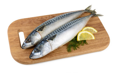 mackerel fish on wooden plate isolated