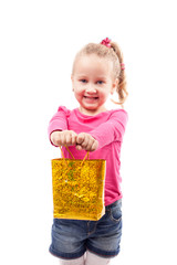 Little girl with shopping bag isolated on white