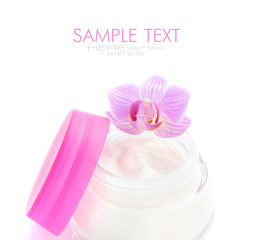 Face cream and beautiful orchid flower on white background