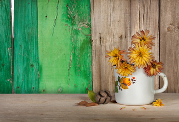 Yellow flowers in cup