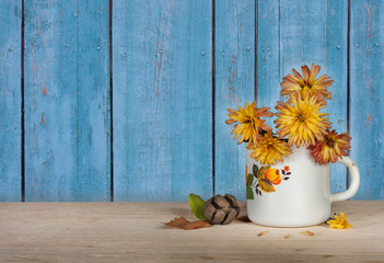 Yellow flowers in cup