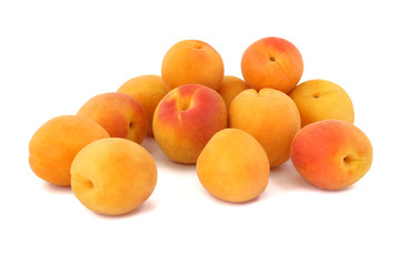 Some apricots isolated on white background