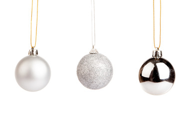 Three of silver color christmas tree baubles