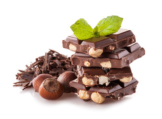 Pile of hazelnut chocolate on white background