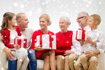 smiling family with gifts at home