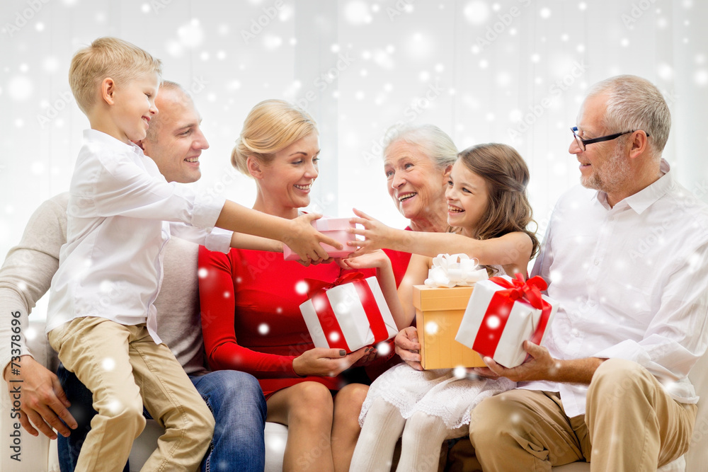 Canvas Prints smiling family with gifts at home