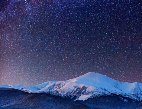 fantastic winter meteor shower and the snow-capped mountains