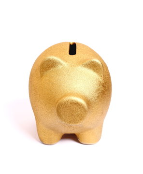 Golden piggy bank from front side