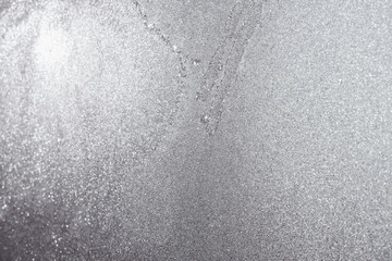 Ice and frost on frozen window