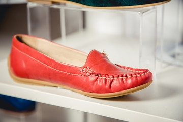 women's shoes on the shelf in the shop sale